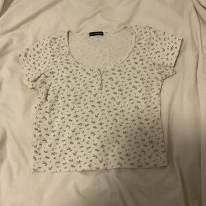 Brandy Melville White Tee with Small Green Floral Print